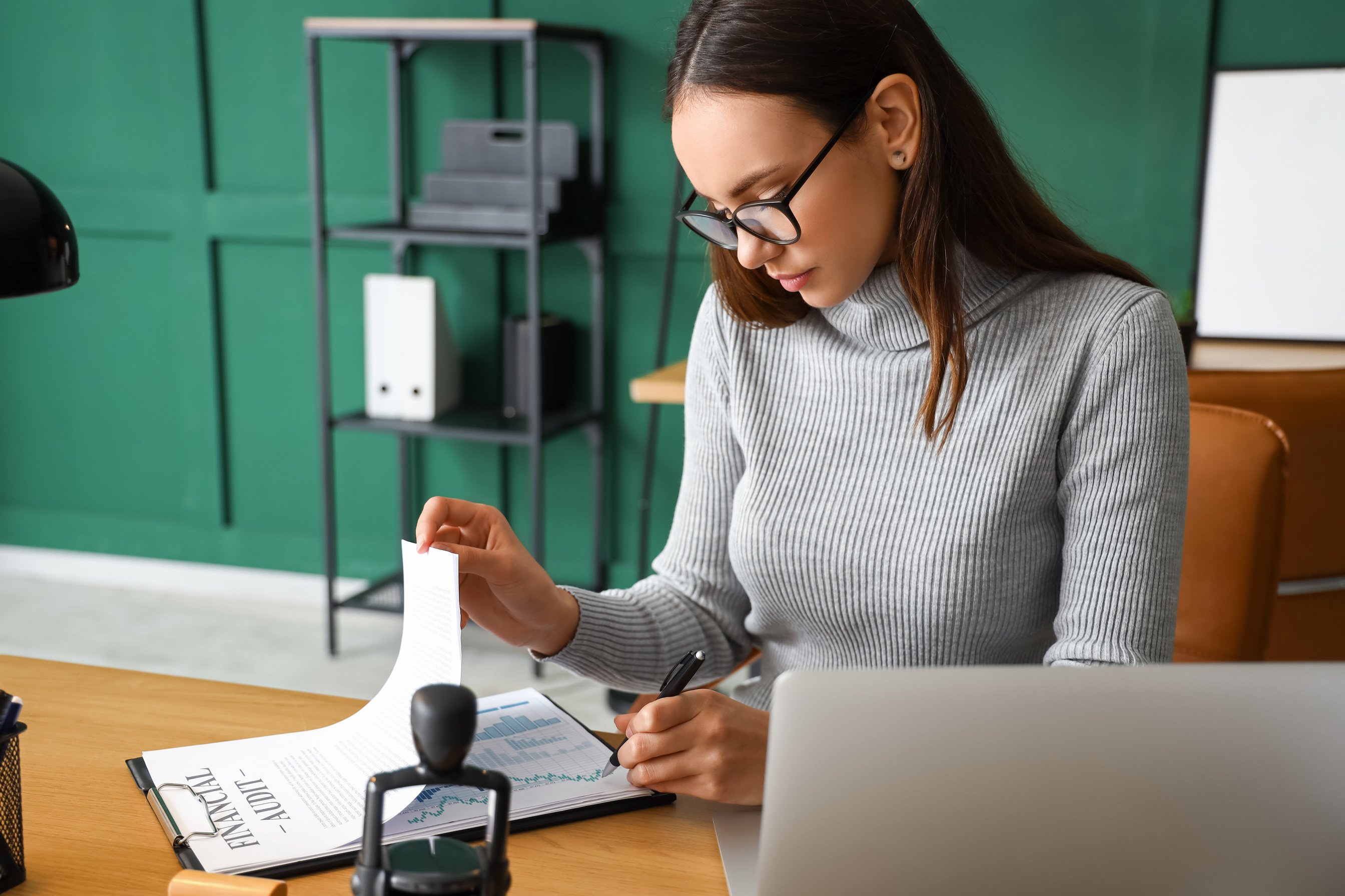 Female Notary Public Working in Office